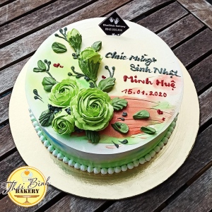 bánh kem bắt hoa hồng xanh lá cây