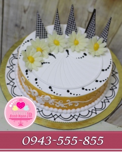 bánh kem mứt cam vẽ hoa văn sô cô la