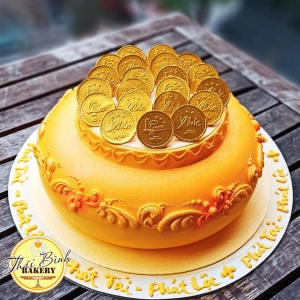 bánh kem thần tài hũ vàng